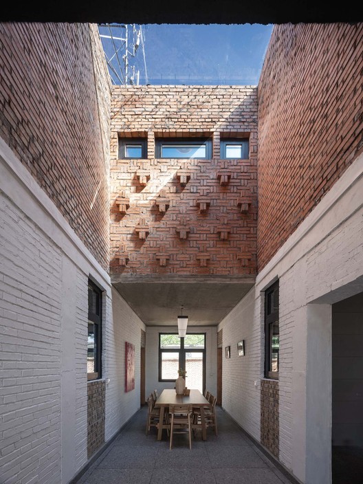 Red Brick Dwellings in Ezi Village / XAUAT - Exterior Photography, Brick, Facade