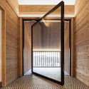 Functional and Creative Ways to Integrate Interior Pivot Doors in the Home   Courtesy of Air-Lux