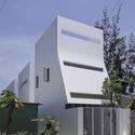 Casa flujo / NAW Studio - Fotografía exterior, Fachada, Ventanas