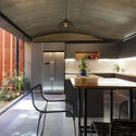 Liquid Earth House / Oficina de arquitectura X - Interior Photography, Table, Countertop, Chair, Sink