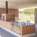 Forno a lenha: 20 exemplos de casas prontas para pizza - Imagem 4 de 27