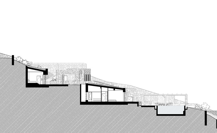 Architectural section illustrating a home integrated into a sloped site.