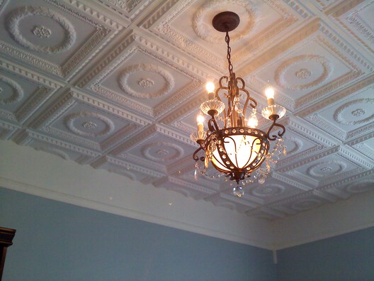 How to Enhance a Plain Ceiling with Decorative Ceiling Tiles - Image 6 of 7