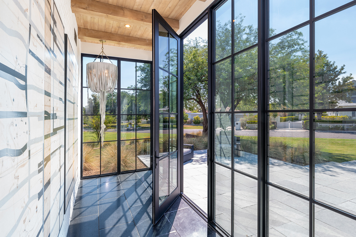 Gallery of Six Residential Projects With Large Glass Entrances 2