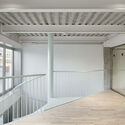 Picture of Transformation of an Industrial Building into an Office Building / Ida ...