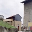 Transformation of a Pigsty in Chavornay / Madeleine architectes + Studio François Nantermod - Exterior Photography, Office Buildings, Facade, Stairs, Door