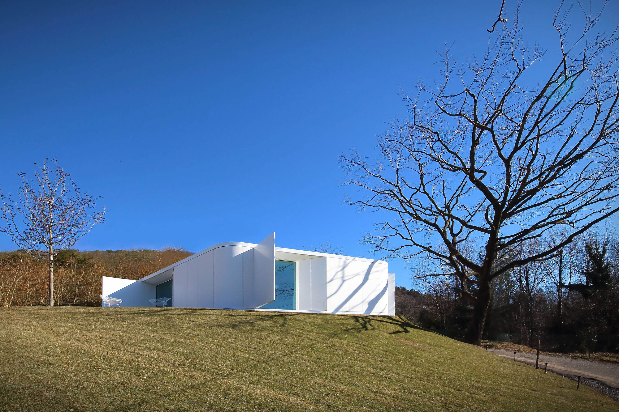 Gallery of Pinwheel House / JM Architecture - 8