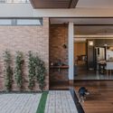 Casa Amarelinho / Perelopes Arquitetura - Fotografia de Interiores, Tijolo
