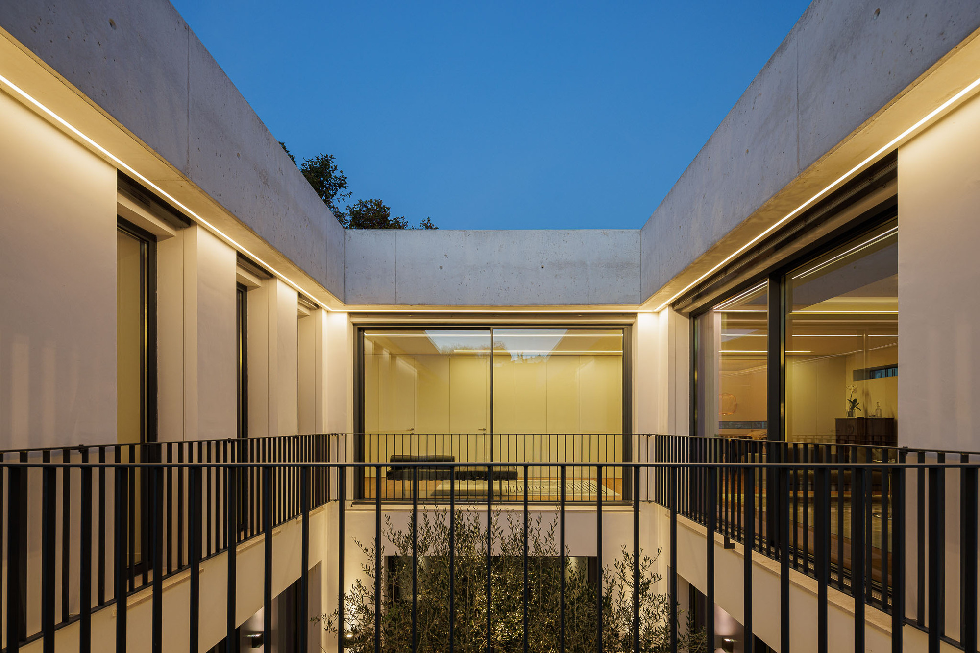 Galería de Casa Concrete 11 / Cage Atelier 20