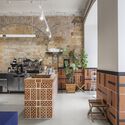 Godshot Coffee Odesa / Petrossjan Architecture Studio - Interior Photography, Coffee Shop Interiors, Kitchen, Beam, Table, Chair