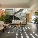 Terra Comb Residential Building / A Threshold - Interior Photography, Sustainability, Table, Chair