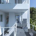 Aalloa Hills Residence / INI Design Studio - Exterior Photography, Apartments, Facade, Door, Handrail, Balcony, Stairs