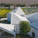 The Library in Ice-Chrysanthemum Field / ATELIER XI - Exterior Photography, Community , Garden, Facade