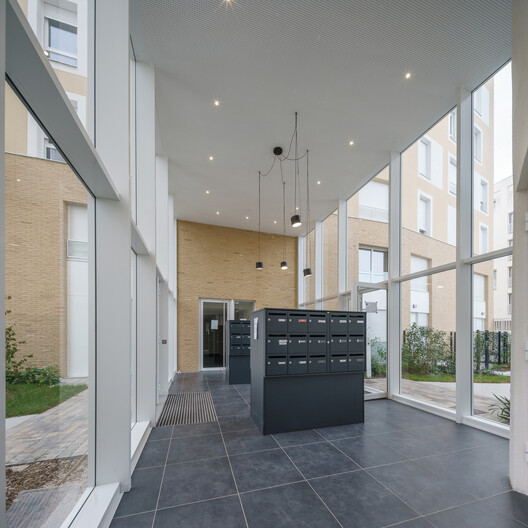 Rives de l'Ourcq Housing / Brenac & Gonzalez & Associés - Interior Photography, Kitchen, Chair, Facade