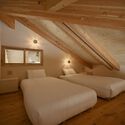 Dos villas en la isla Ishigaki / 07BEACH - Fotografía de interiores, dormitorio, cama, vigas