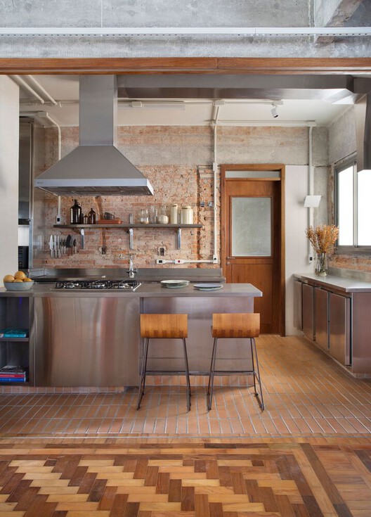 Vibrancy and Utility: Embracing Color in Urban Apartment Kitchens - Image 16 of 34