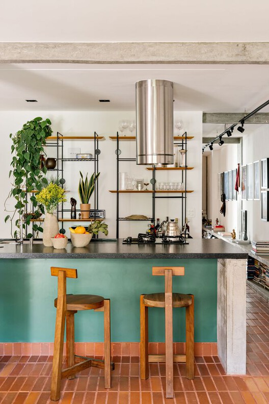 Vibrancy and Utility: Embracing Color in Urban Apartment Kitchens - Image 8 of 34