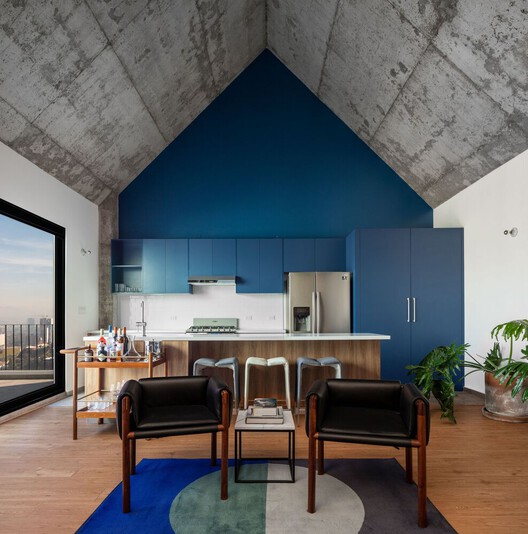 Vibrancy and Utility: Embracing Color in Urban Apartment Kitchens - Image 6 of 34