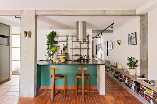 Vibrancy and Utility: Embracing Color in Urban Apartment Kitchens - Image 7 of 34