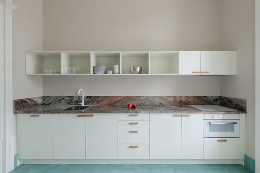 Vibrancy and Utility: Embracing Color in Urban Apartment Kitchens - Image 31 of 34