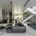 Casa em Nha Trang / NAQI & Partners - Fotografia de Interiores, Casas, Escada, Cadeira
