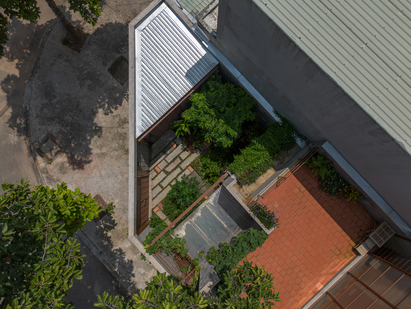 Casa em Binh Duong / Tad.atelier - Fotografia de Exterior, Jardim