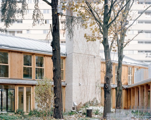 Early Childhood Center / Guillaume Ramillien Architecture Early Childhood Center / Guillaume Ramillien Architecture - Exterior Photography, Wood, Door, Concrete