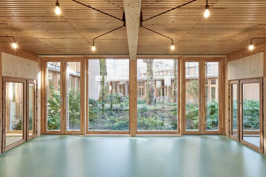 Early Childhood Center / Guillaume Ramillien Architecture Early Childhood Center / Guillaume Ramillien Architecture - Interior Photography, Wood, Door, Column