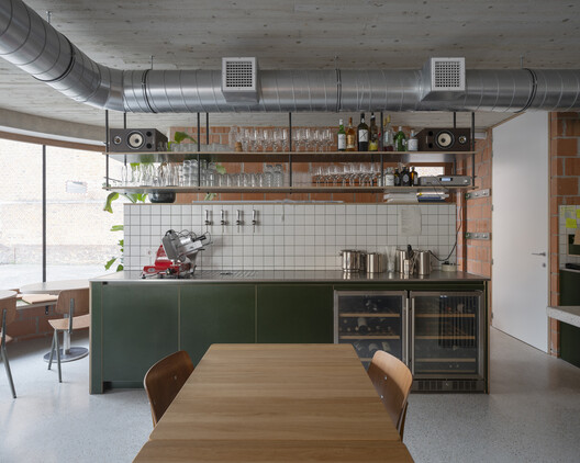 Peper Multifunctional Building / Architecten De Bruyn - Interior Photography, Kitchen, Table, Lighting, Countertop, Chair, Shelving