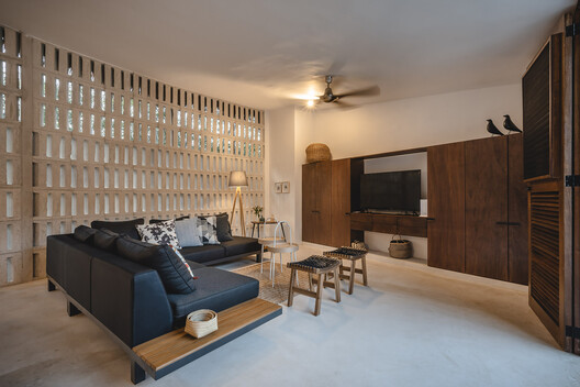 Casa Xcunya / APV Arquitectura para vivir - Fotografía interior, Sala de estar, Madera, Iluminación, Estanterías, Sillas