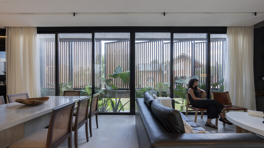 Casa Rosas / Etéreo Arquitectos - Fotografía interior, Sala de estar, Madera, Sillas