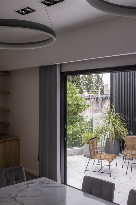 Oficinas en Villa Urquiza / Christian Silva arquitecto - Fotografía interior, Iluminación, Sillas