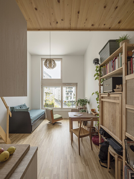 Quartiershaus am Stadtbalkon / feld72 - Interior Photography, Wood, Shelving, Table, Lighting, Chair