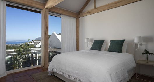 Umoya Boutique Hotel / SkreinStudios - Fotografía interior, Dormitorio, Madera, Camas