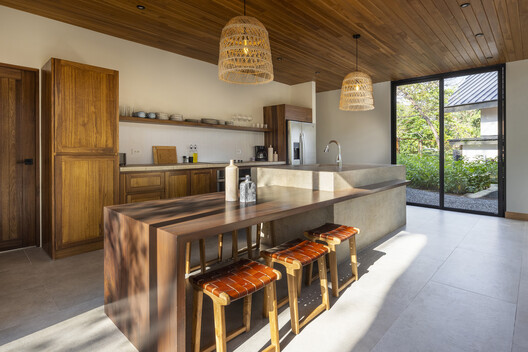 Indo Avellanas House / Garton Group Architecture  - Interior Photography, Kitchen, Countertop, Wood, Table, Lighting, Chair