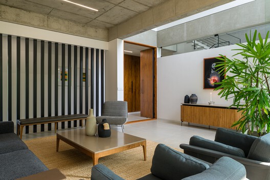 The House That Meets the River / LIJO RENY architects - Interior Photography, Living Room, Wood, Table, Lighting, Chair