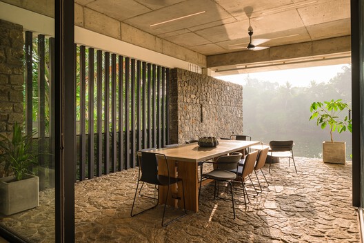 The House That Meets the River / LIJO RENY architects - Interior Photography, Dining room, Wood