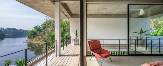 The House That Meets the River / LIJO RENY architects - Interior Photography, Living Room, Balcony