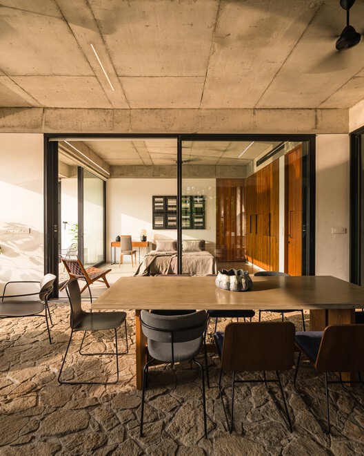 The House That Meets the River / LIJO RENY architects - Interior Photography, Dining room, Wood, Table, Chair