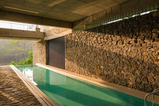 The House That Meets the River / LIJO RENY architects - Image 38 of 57