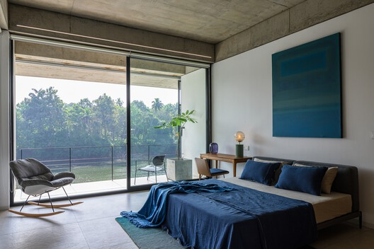The House That Meets the River / LIJO RENY architects - Interior Photography, Bedroom, Bed, Chair