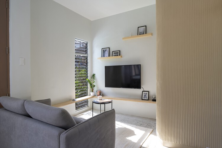 Sienna Net-Zero Home / billionBricks 10 Sienna Net-Zero Home / billionBricks - Interior Photography, Living Room, Lighting, Sofa, Shelving