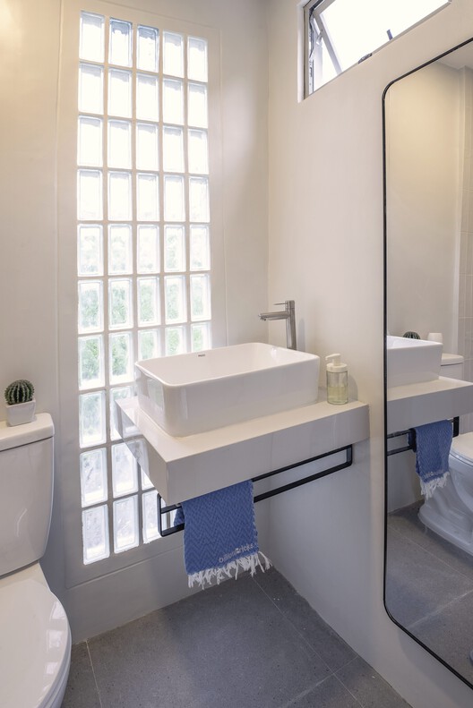 Sienna Net-Zero Home / billionBricks - Interior Photography, Bathroom, Sink, Toilet, Glass