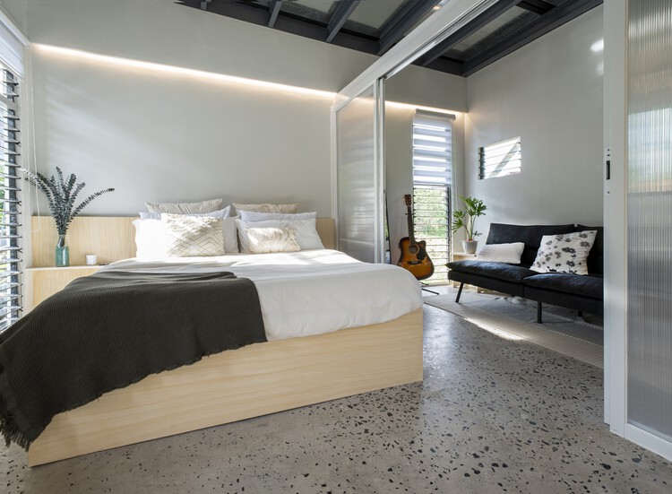 Sienna Net-Zero Home / billionBricks 13 Sienna Net-Zero Home / billionBricks - Interior Photography, Bedroom, Wood, Bed, Lighting, Chair