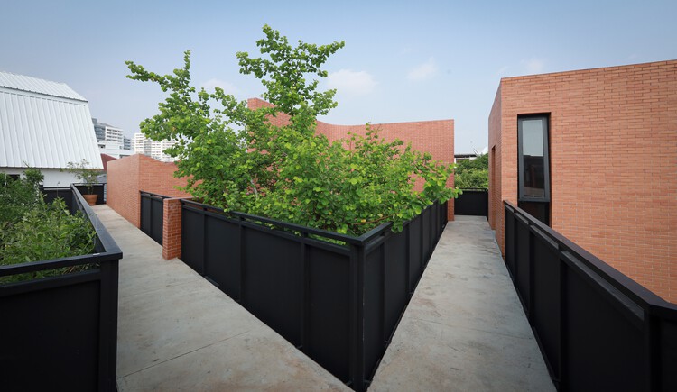 Casa, Café e Galeria Brick Journey / Volume Matrix studio - Fotografia de Exterior