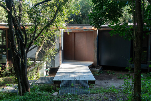 Casa en el bosque / MALVINA ZAYAT estudio de arquitectura  - Fotografía exterior, Madera