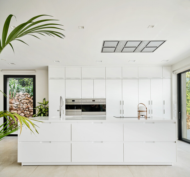 PR/Guilem Casa Carrera - Fotos interiores, cocina, excimera, madera, iluminación