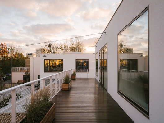 Widna Haven Community Center and Library / PB STUDIO + studiomania + IPA Ipreferanalog - Exterior Photography, Balcony, Stairs, Handrail, Courtyard