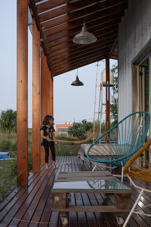 Casa Ona / Juliana Mondinalli - Franco Palacios Beltran - Fotografía exterior, Madera, Terraza