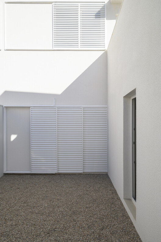 28 Patios y 14 viviendas / Crearctive + RKT Estudio - Fotografía interior, Concreto